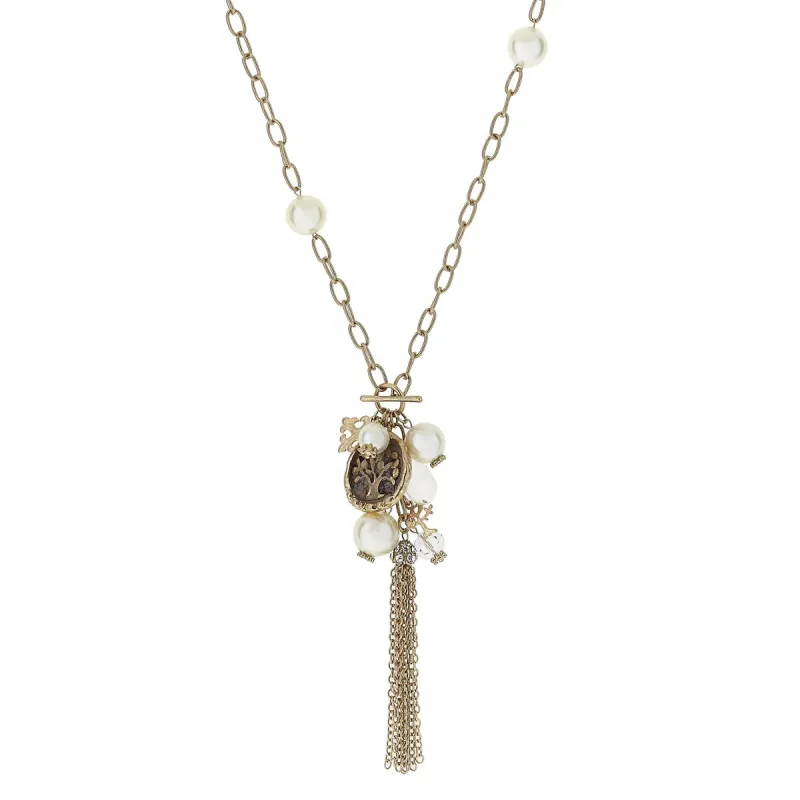 Tree of Life Pearl Station, Epoxy and Charm Tassel Necklace sold by Charming Charlie