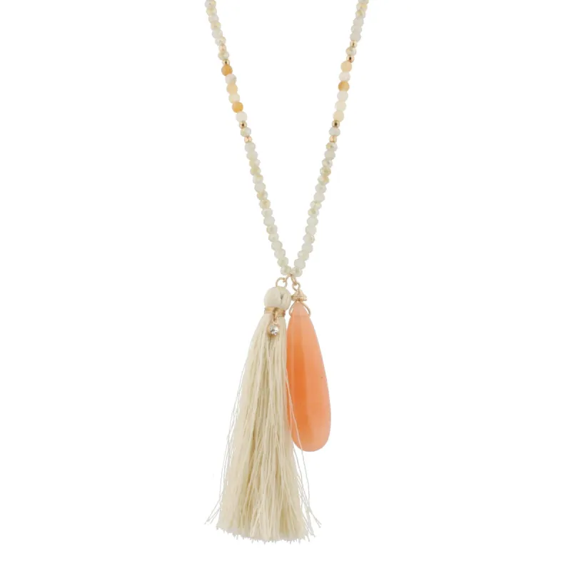 44" Gold Chain Half Neutral Beaded Necklace with Cream Tassel and Peach Stone Pendant sold by Charming Charlie