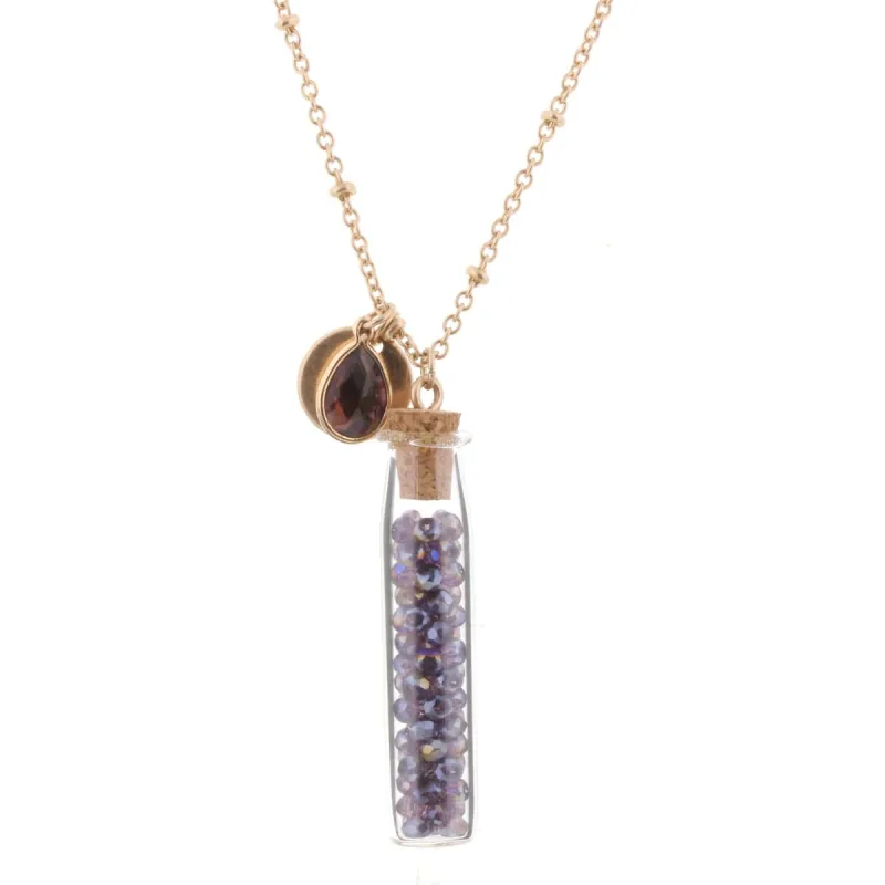 30" Necklace with Amethyst Bead Filled Bottle, 3" Ext. sold by Charming Charlie