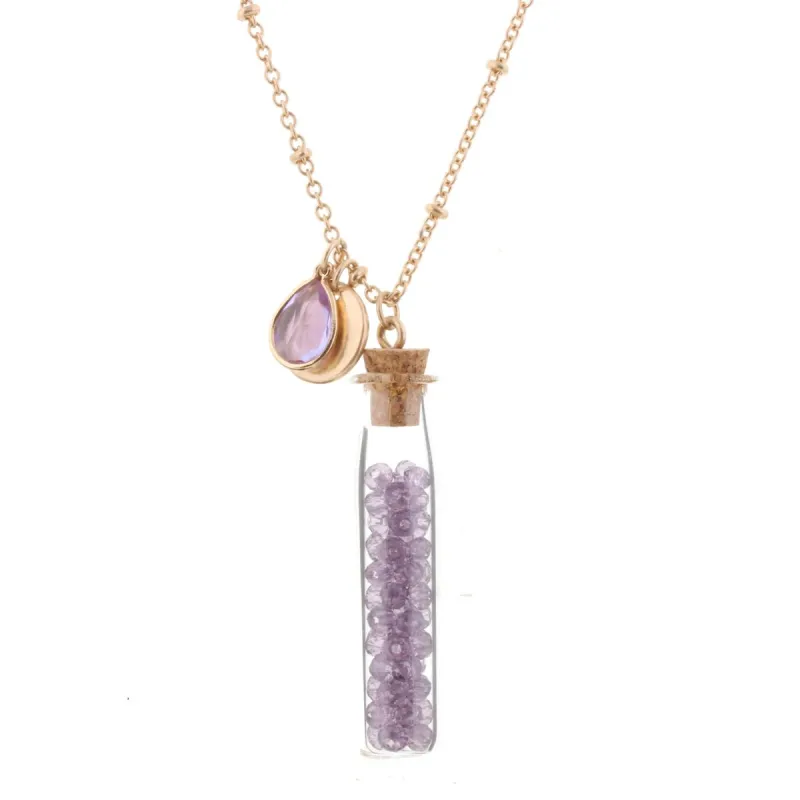 30" Necklace with Light Amethyst Bead Filled Bottle,3" Ext. sold by Charming Charlie