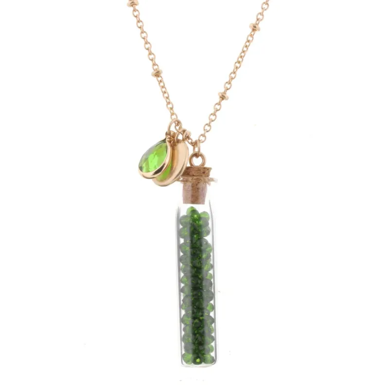 30" Necklace with Emerald Bead Filled Bottle, 3" Ext. sold by Charming Charlie