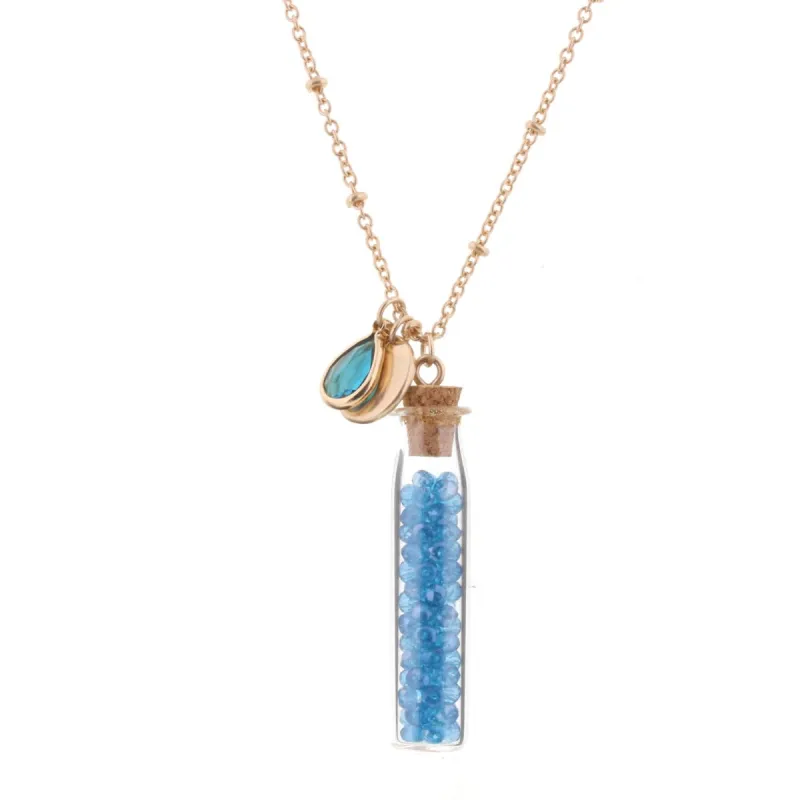 30" Necklace with Aquamarine Bead Filled Bottle, 3" Ext. sold by Charming Charlie