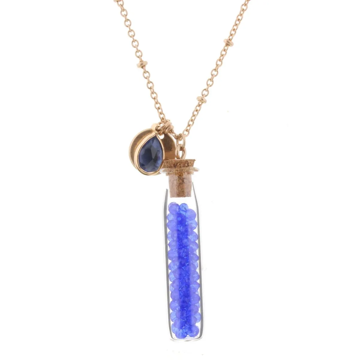 30" Necklace with Sapphire Bead Filled Bottle, 3" Ext. sold by Charming Charlie