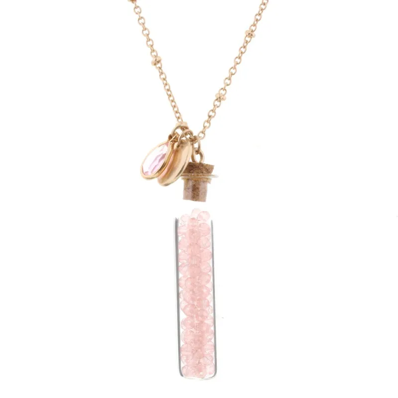 30" Necklace with Rose Quartz Bead Filled Bottle, 3" Ext. sold by Charming Charlie