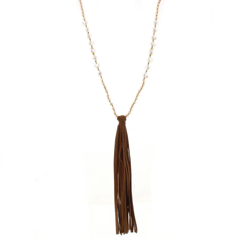 32" Champagne & Pearl Partial Handknotted Necklace with Tan Leather Tassel, 3" Ext. sold by Charming Charlie