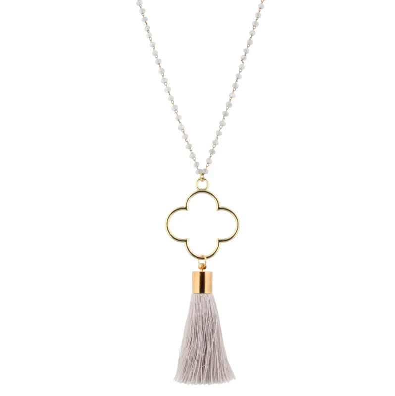 28" Grey Beaded Necklace with Clover & Grey Tassel, 3" Ext. sold by Charming Charlie