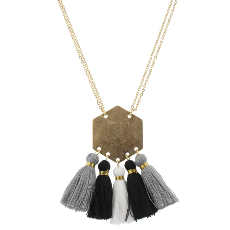 32" Gold Hexagon Necklace with Grey, Jet and White Tassels, 3" Ext. sold by Charming Charlie