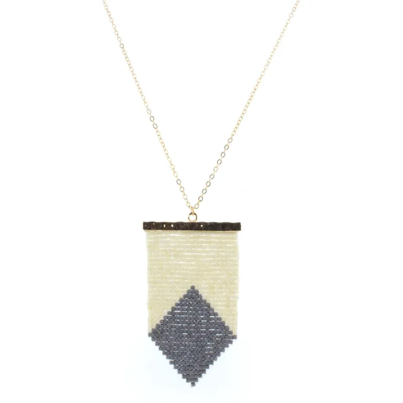 32" Gold Chain Necklace with Cream & Grey Beaded Shield, 3" Ext. sold by Charming Charlie