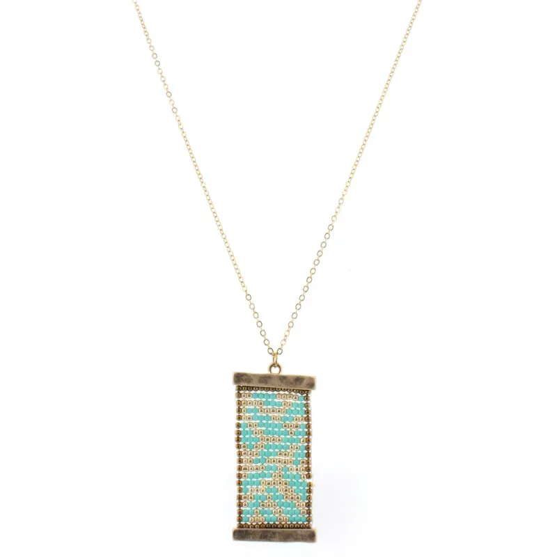 32" Gold Chain Necklace with Turquoise & Gold Beaded Shield, 3" Ext. sold by Charming Charlie