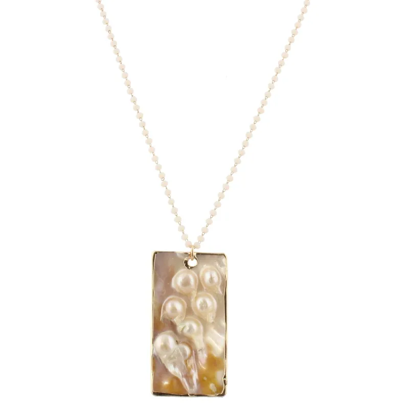 32" Delicate Soft Peachy White Linked Necklace with Shell Rectangle, 3" Ext. sold by Charming Charlie