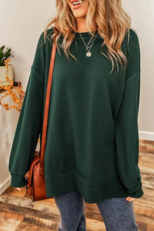 Round Neck Drop Shoulder Slit Sweatshirt sold by Charming Charlie