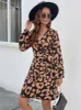 Printed Surplice Long Sleeve Dress sold by Charming Charlie