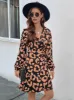 Printed Surplice Long Sleeve Dress sold by Charming Charlie