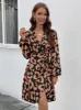 Printed Surplice Long Sleeve Dress sold by Charming Charlie