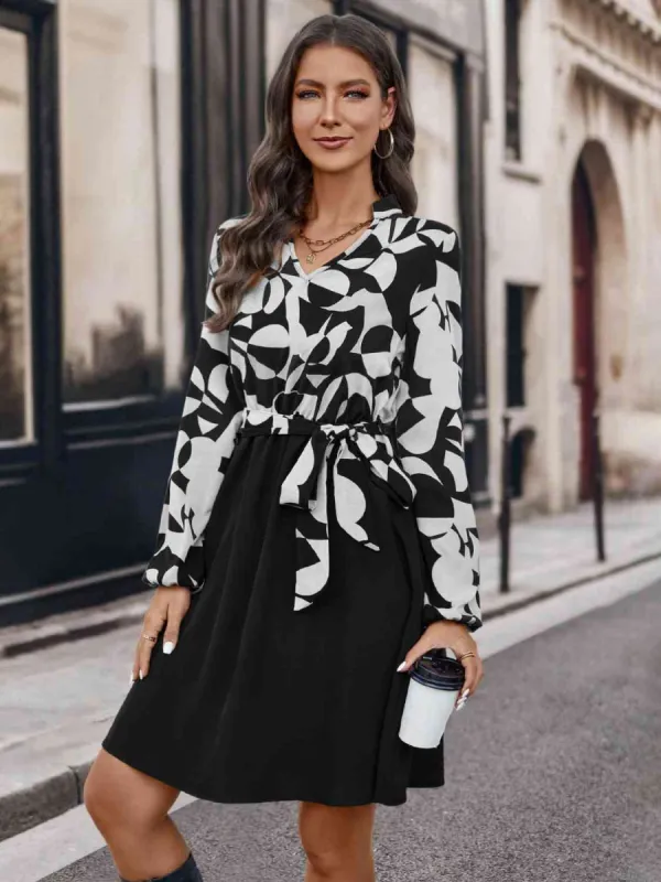 Contrast Notched Tie Front Long Sleeve Dress sold by Charming Charlie