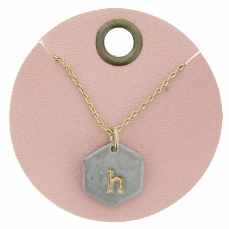 16" Grey Stamped Initial "H" Hexagon Necklace, 3" Ext. sold by Charming Charlie