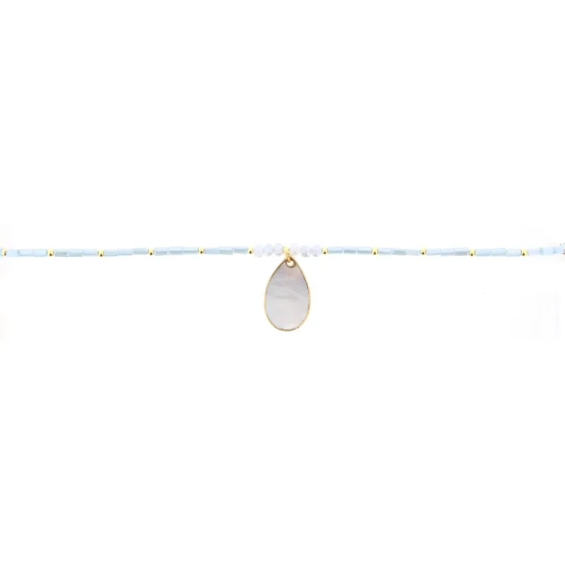 16" Light Blue Beaded Necklace with Shell Teardrop, 3" Ext. sold by Charming Charlie