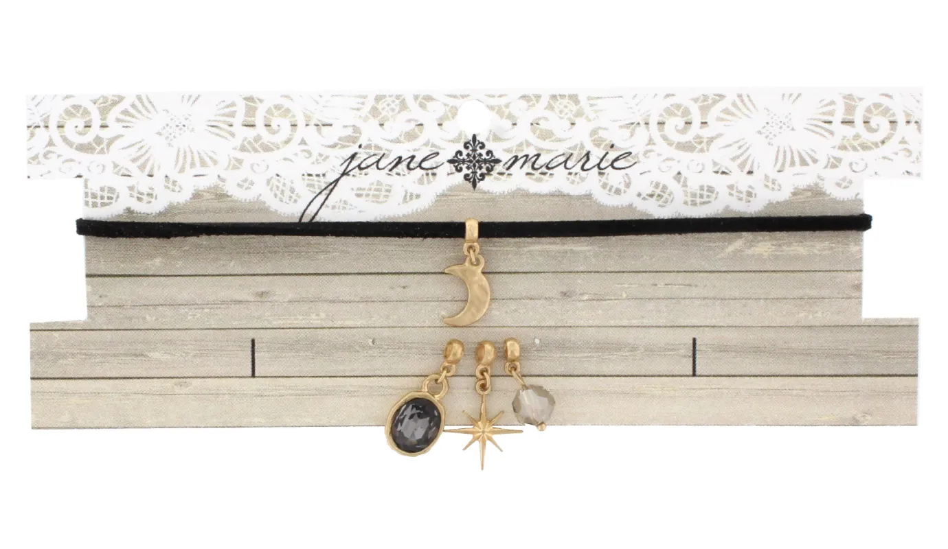 12" Black Leather Choker with Moon, Black Diamond Bead, Black Diamond Babochon, and North Star Charms, 3" Ext. sold by Charming Charlie