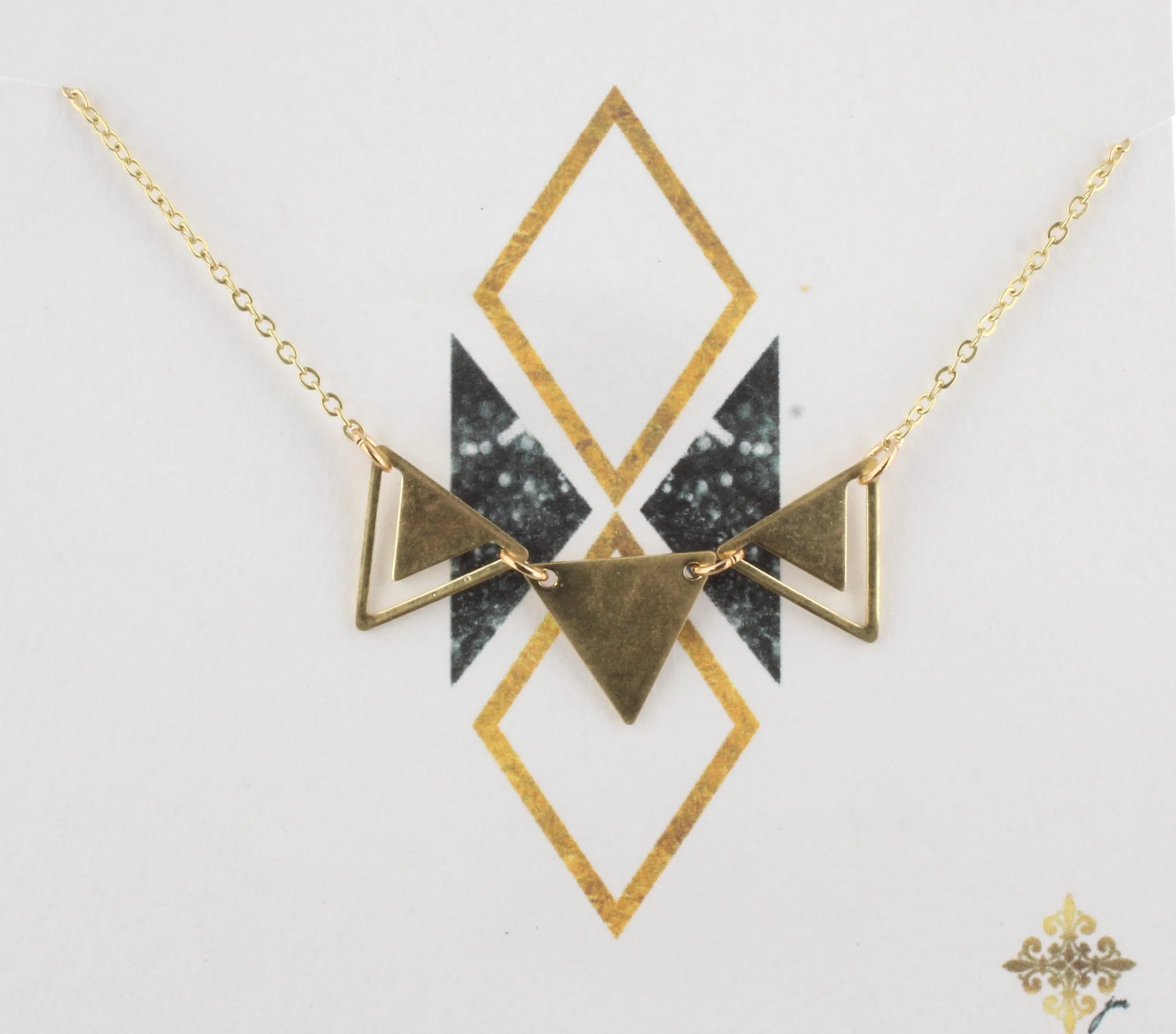 16" Gold Chain Necklace with Triangle Bib, 3" Ext. sold by Charming Charlie