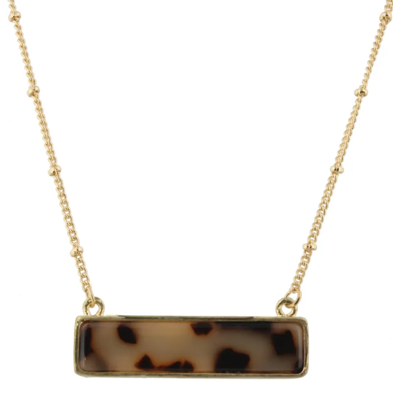 16" Gold Chain Necklace with Leopard & Jet Marbled Double Sided Resin Rectangle, 3" Ext. sold by Charming Charlie