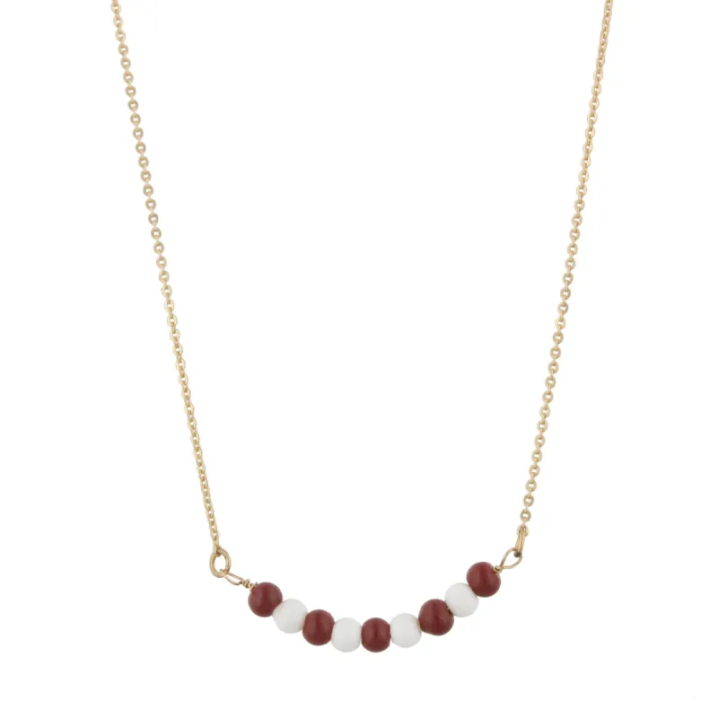 16" Gold Necklace with Alternating Maroon/White Beads, 3" Ext. sold by Charming Charlie