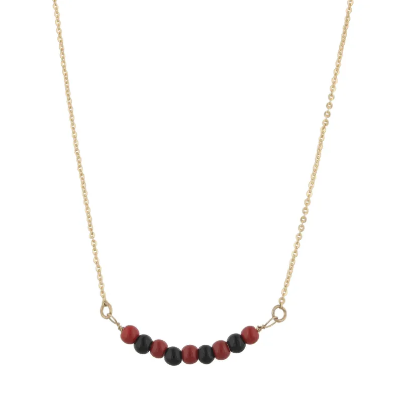 16" Gold Necklace with Alternating Garnet/Black Beads, 3" Ext. sold by Charming Charlie
