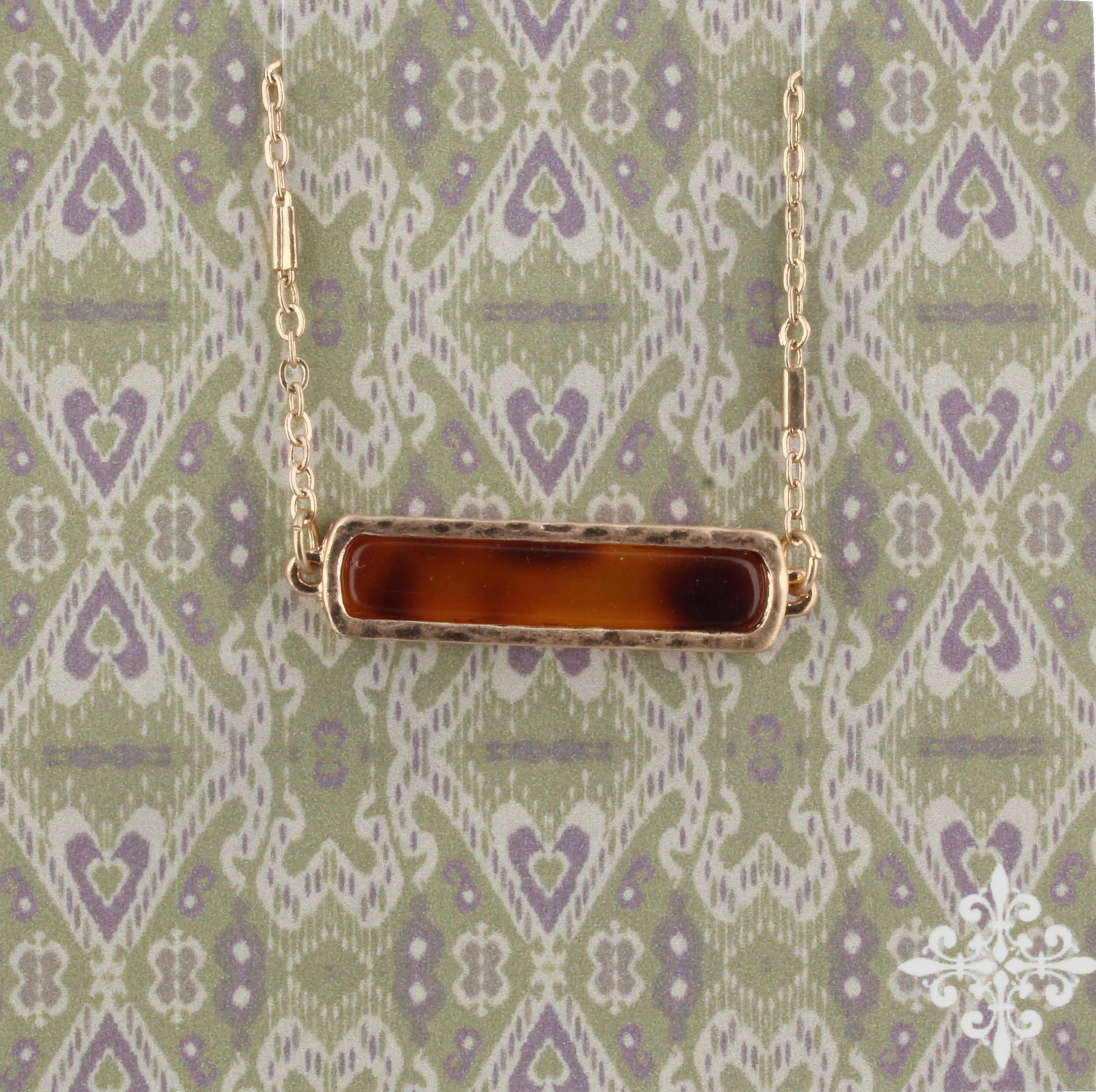16" Brown Resin Bar Necklace, 3" Ext. sold by Charming Charlie