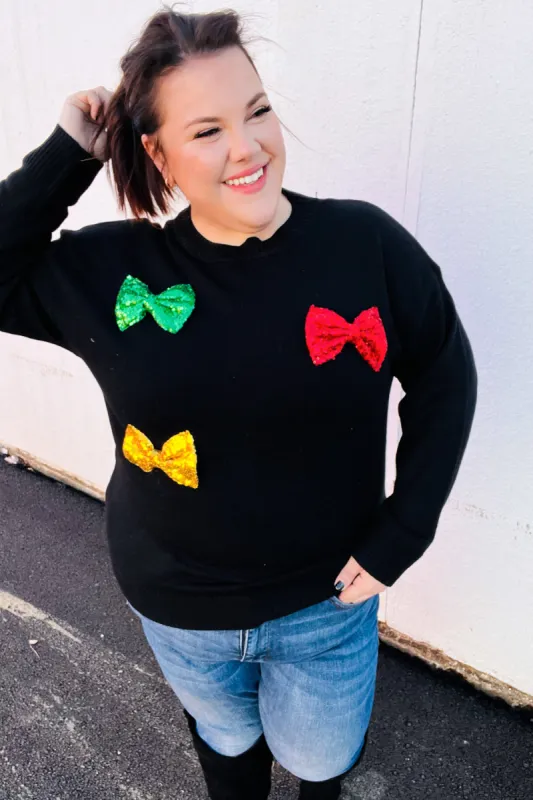Be Merry Black Multicolor Sequin Bow Knit Sweater sold by Charming Charlie