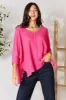 Zenana Full Size Round Neck High-Low Slit Knit Top sold by Charming Charlie