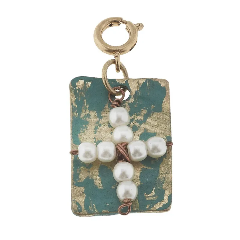 Pearl Cross Charm sold by Charming Charlie