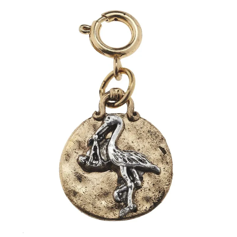 Antique Gold and Antique Silver Stork Charm sold by Charming Charlie