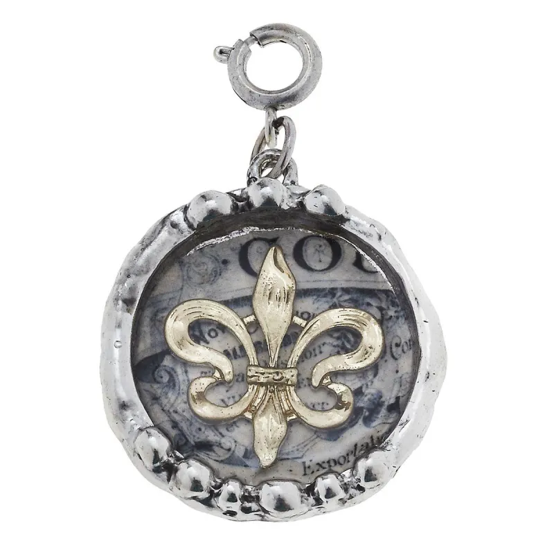 Antique Gold Epoxy Fleur De Lis Charm sold by Charming Charlie