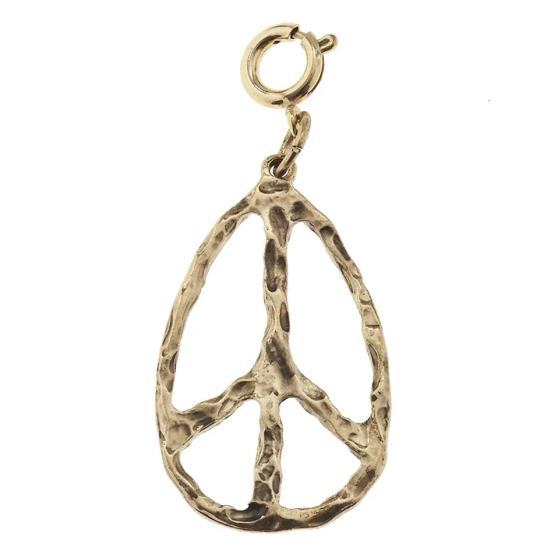 Antique Gold Peace Charm sold by Charming Charlie