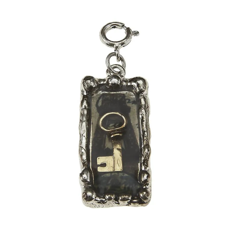 Key and French Words Rectangle Epoxy Charm sold by Charming Charlie