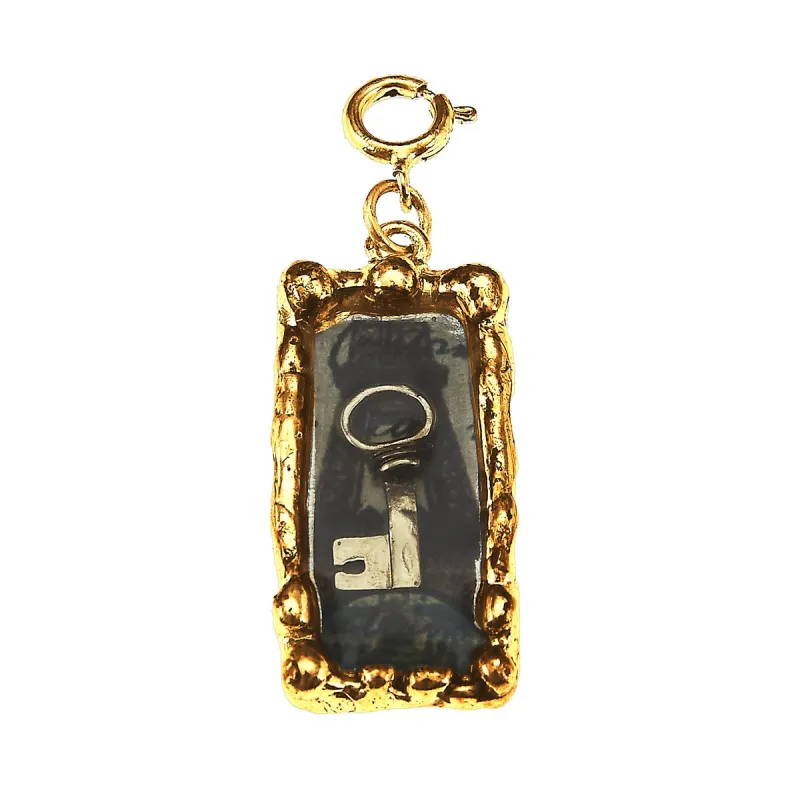 Key and French Words Antique Gold Rectangle Epoxy Charm sold by Charming Charlie