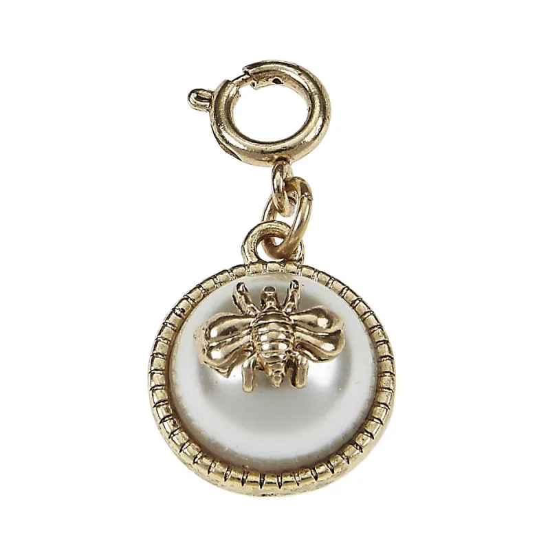 Ivory Pearl Cabochon with Antique Gold Bumble Bee Charm sold by Charming Charlie