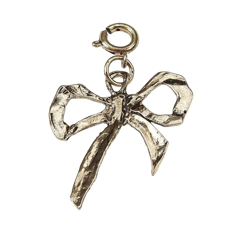 Light Antique Gold Bow Charm sold by Charming Charlie