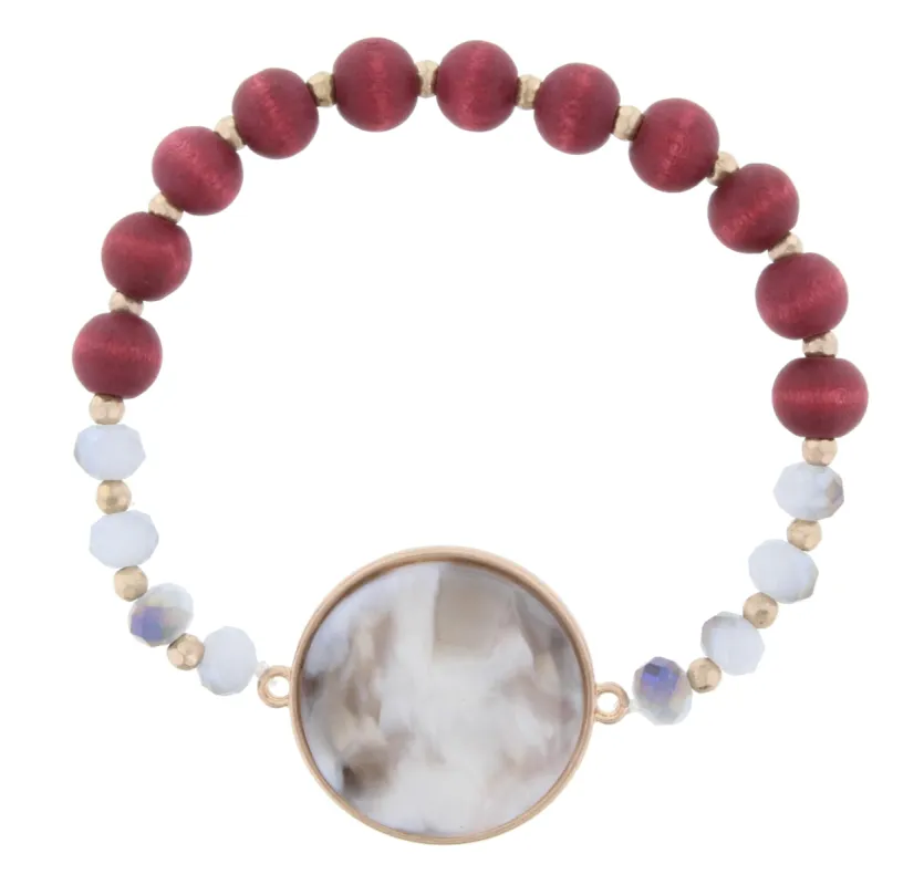 Grey and Maroon Beaded Stretch Bracelet with Grey and White Circle Resin sold by Charming Charlie