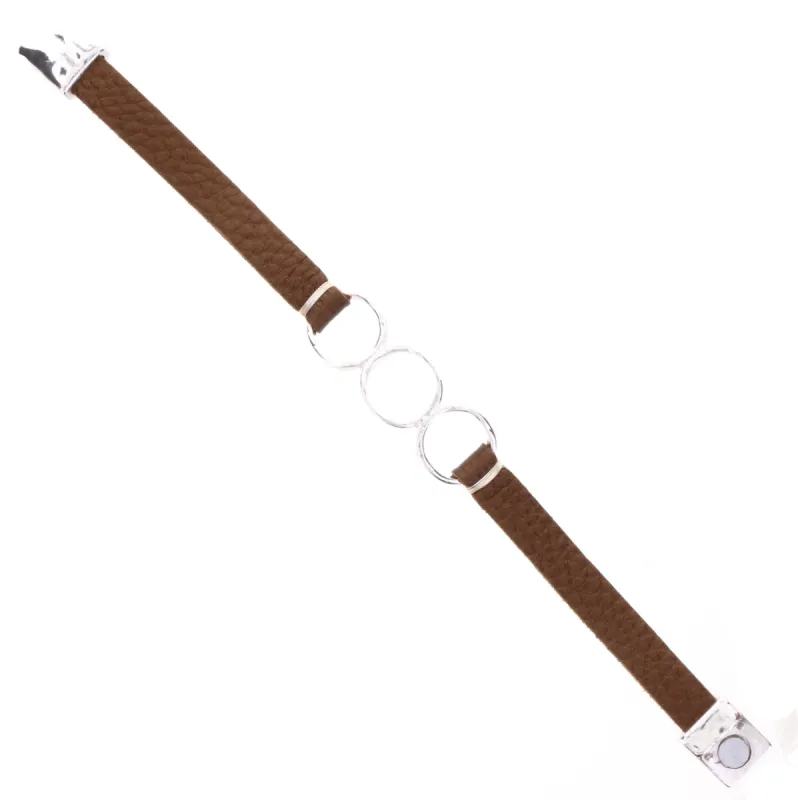Bronze Leather Bracelet with 3 Silver Rings sold by Charming Charlie