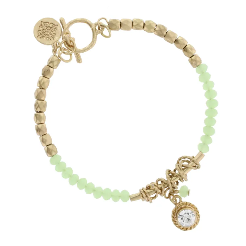 Antique Gold and Light Green Beaded Toggle Bracelet with Rhinestone Pendant sold by Charming Charlie