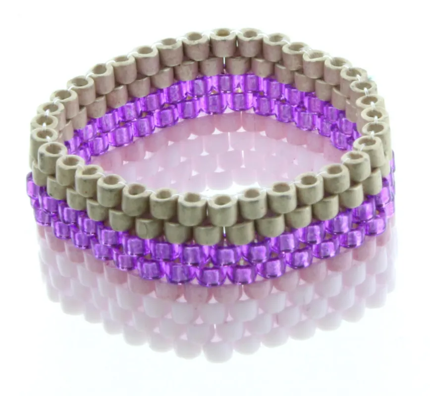 Lavender, Gold, and Metallic Purple Seed Bead Ring sold by Charming Charlie
