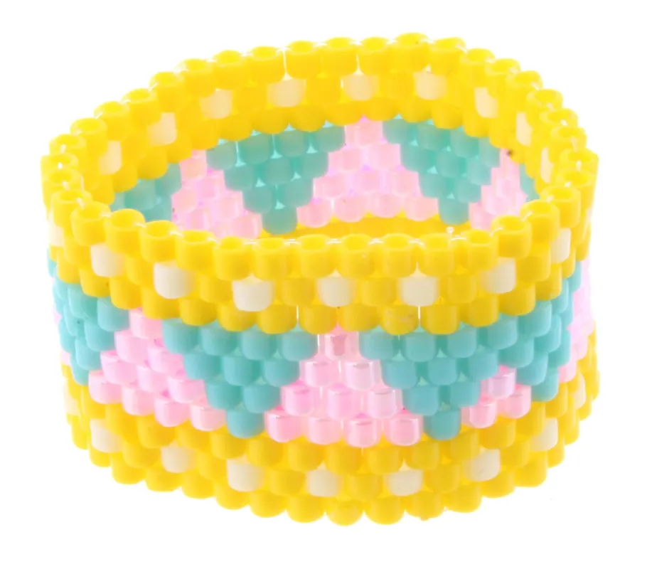 Yellow Seed Bead Ring with Pink and Turquoise Triangles sold by Charming Charlie
