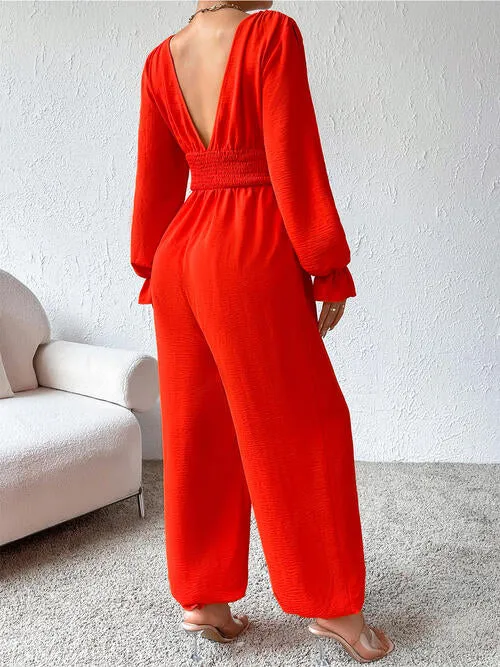 Plunge Smocked Flounce Sleeve Jumpsuit sold by Charming Charlie product image thumbnail 2