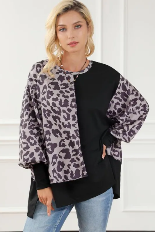 Leopard Round Neck Lantern Sleeve Slit Sweatshirt sold by Charming Charlie
