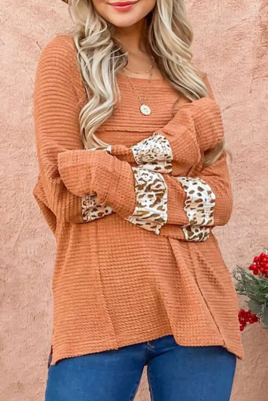 Waffle-Knit Leopard Long Sleeve Slit Blouse sold by Charming Charlie