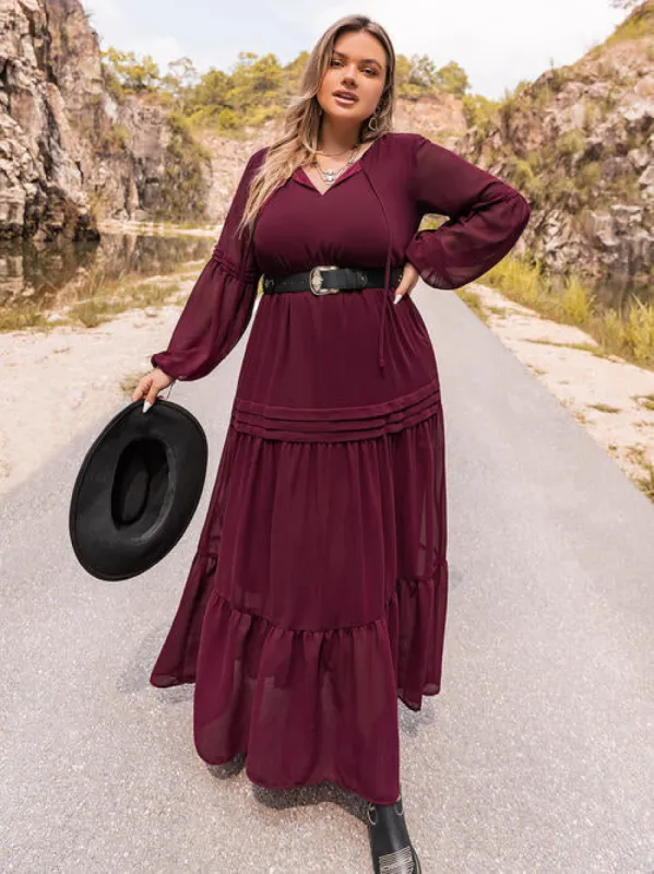Plus Size Tie Neck Ballon Sleeve Tiered Dress sold by Charming Charlie