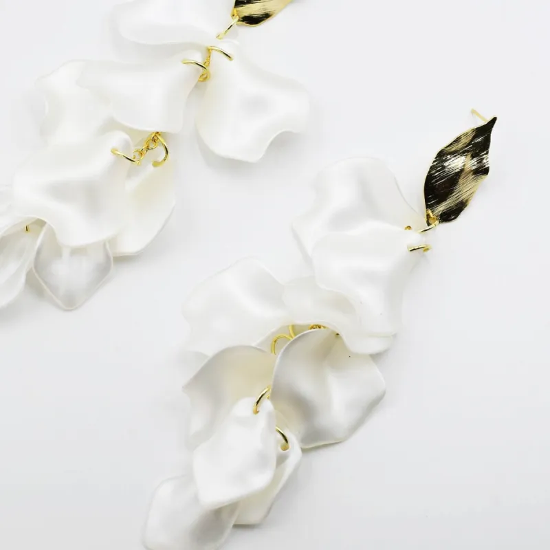 Dangle Petals White sold by Charming Charlie