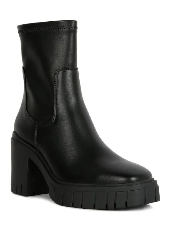 Faux Leather Platform Heeled Ankle Boot sold by Charming Charlie
