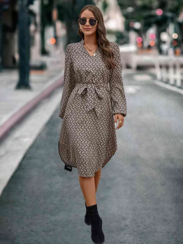 Printed Notched Tie Front Long Sleeve Dress sold by Charming Charlie