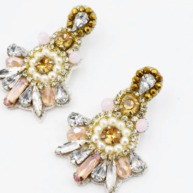 Bejeweled Chandelier sold by Charming Charlie